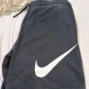 Nike men’s black cloth shorts with White Logo
2xl